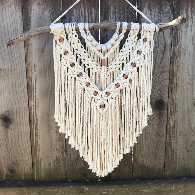 Layered Macrame Wall Hanging With A Piece Of Driftwood