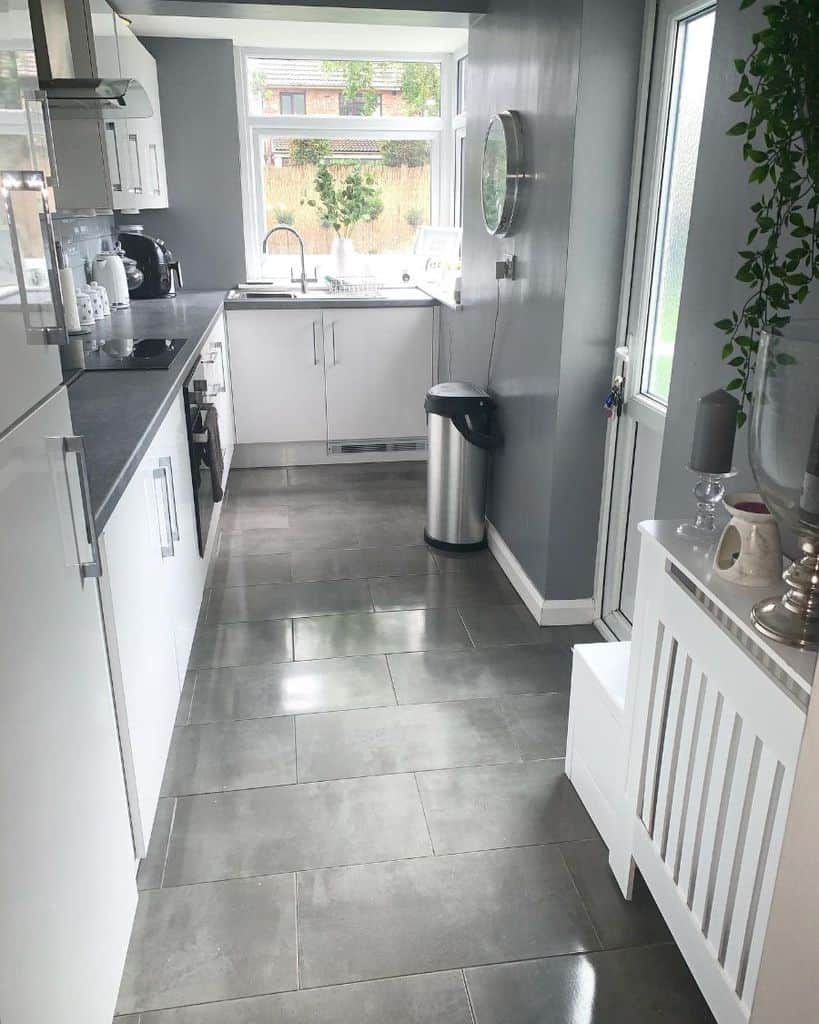 Gray Kitchen With White Frame Window