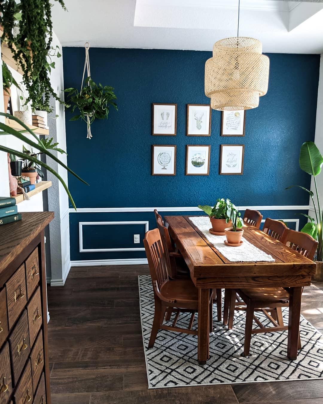 Blue Accent Wall With Wooden Furniture And Flooring