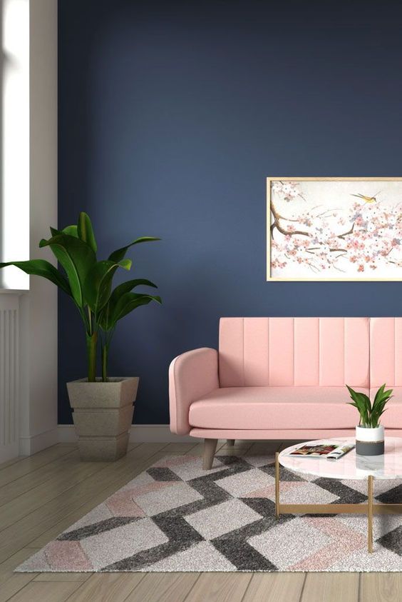 Blue Accent Wall With Pink Furniture And Area Rug