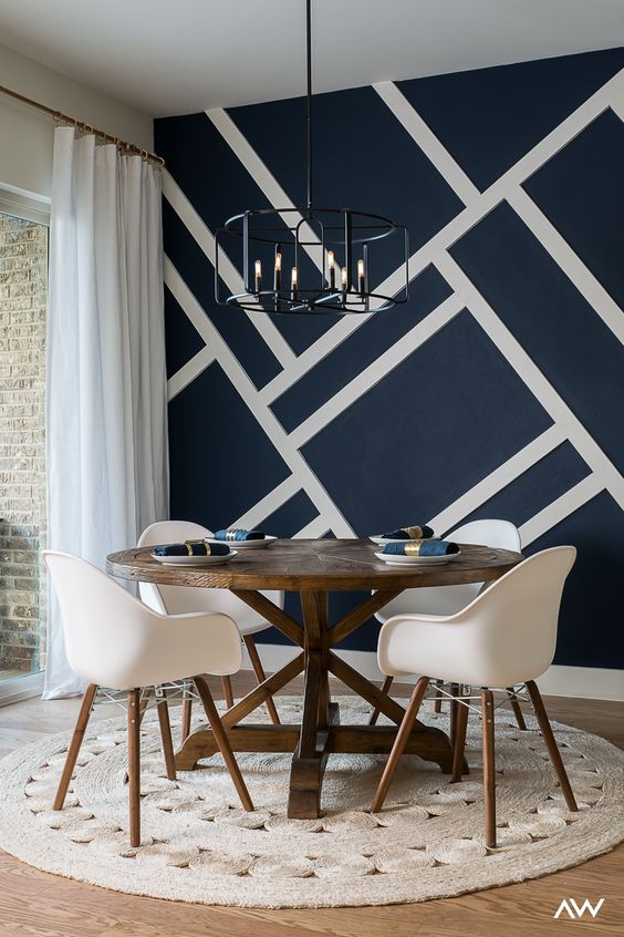 Dark Blue Walls With White Trim In Dining Room