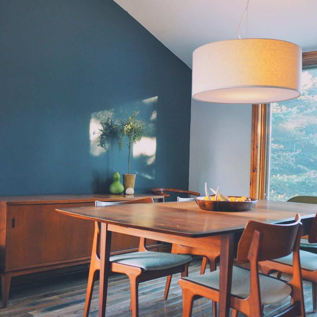 Navy Blue Accent Wall With Darkwood Furniture For Dining Room