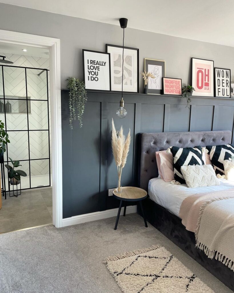 Bedroom With Dark Grey wainscoting And White Baseboard