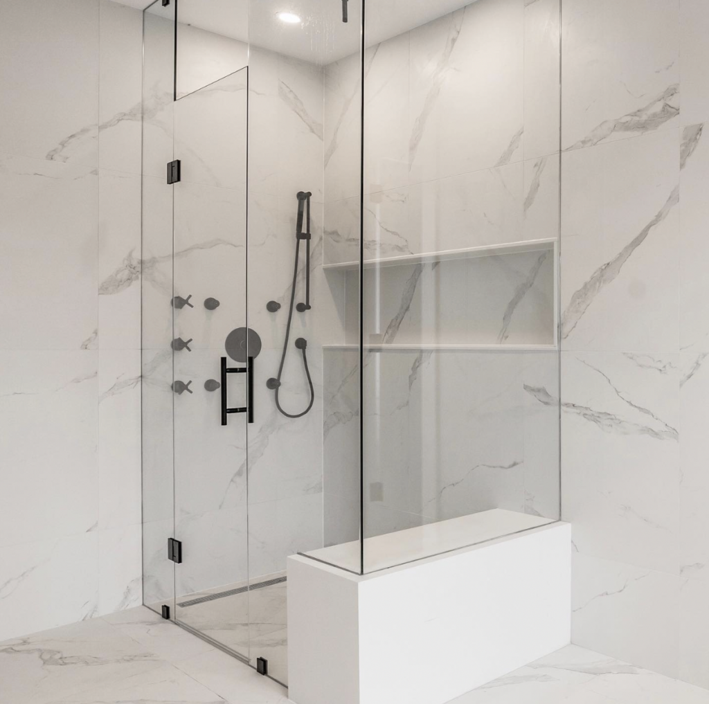 White Marble Shower Ideas With Built-In Shower Bench