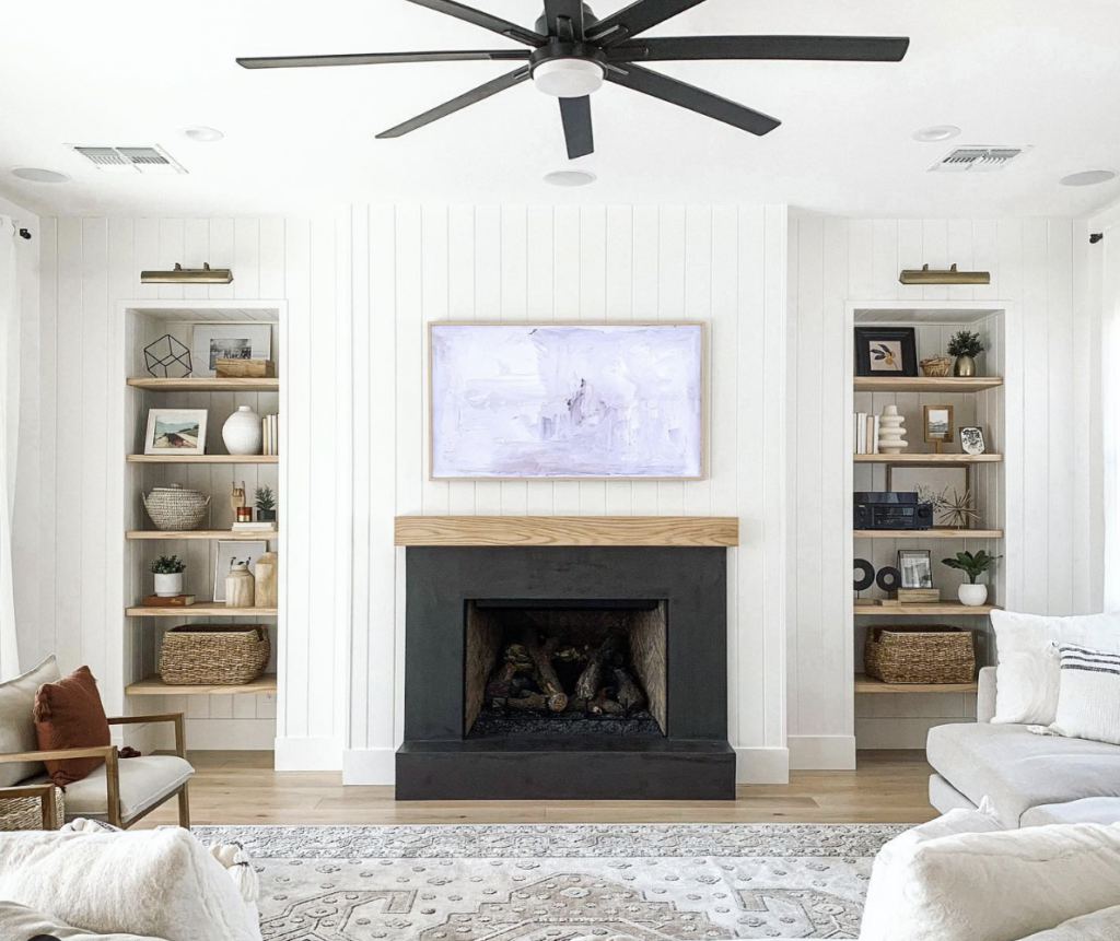 Vertical Shiplap Wall Fireplace With Floating Built-In On Both Sides