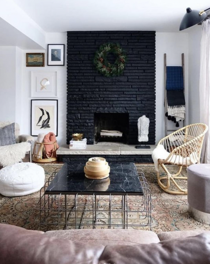 Black Stone Fireplace Wall With Wreath