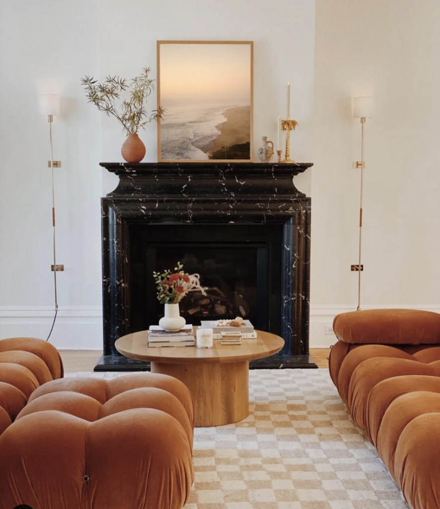Black Marble Fireplace Mantel With Orange Furniture