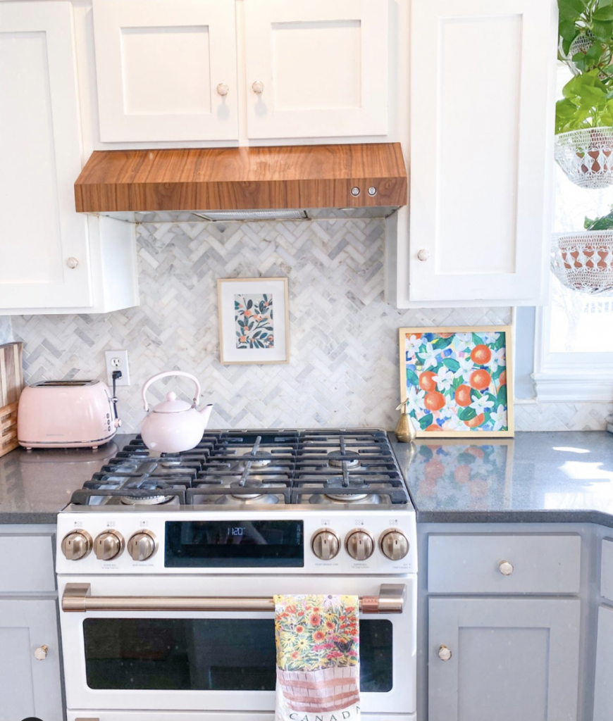 White Kitchen Cabinets And Glass Mosaic Tile With Wood Hood Vent Cover