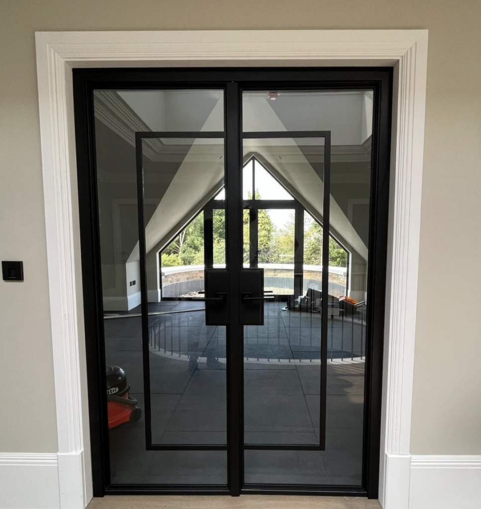 Black Framed Glass Door With White Trim