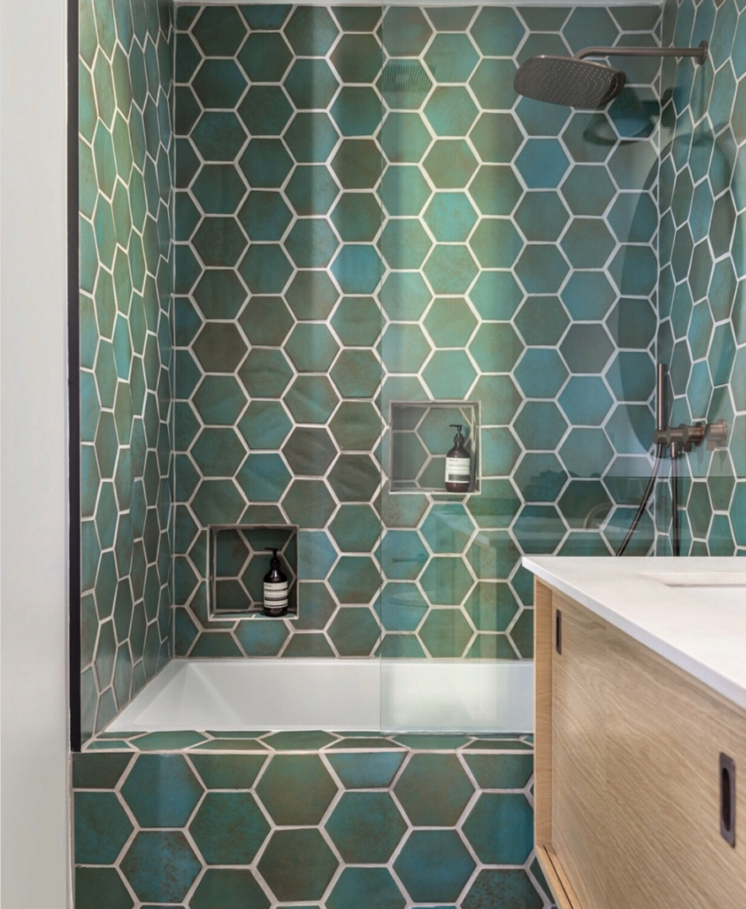 Blue Tile Shower With Wooden Vanity
