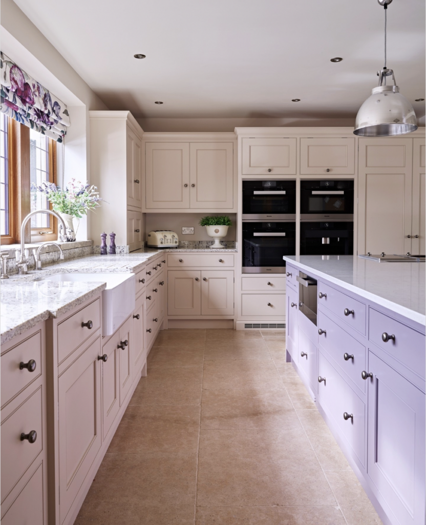 Pink And Purple Kitchen Cabinetry With Built-In Kitchen Appliances