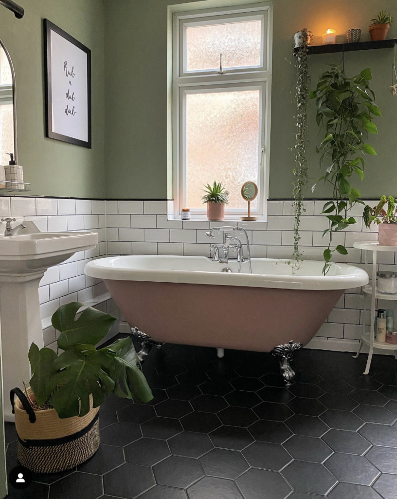 Green Bathroom With Black Hexagon Tile Floor