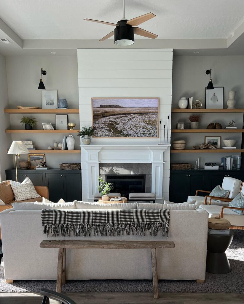 Fireplace With Floating Shelves And Black Pendant Lights