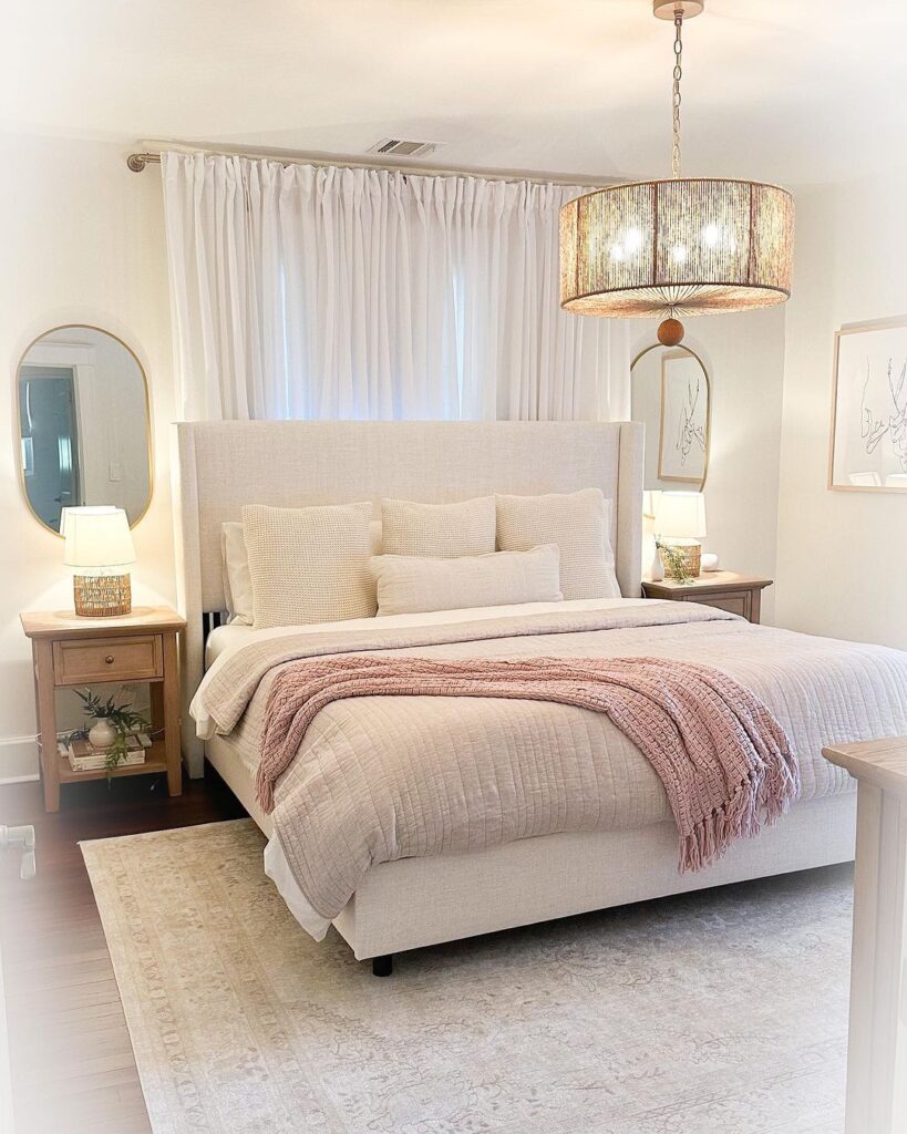 White Bedroom With Light Wood Nightstands On Both Sides 