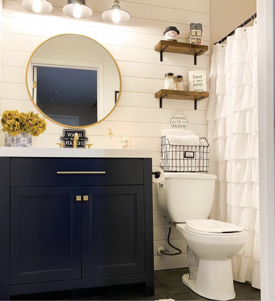 White Bathroom Shiplap Wall With Wooden Accents