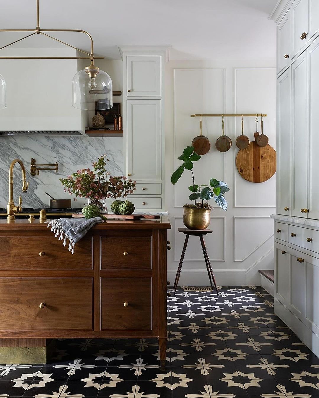 Vintage Charm: Shaker Cabinets with Antique Brass Pulls