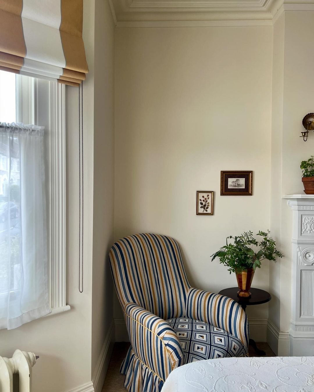 Striped Wingback Chair in a Classic Bedroom