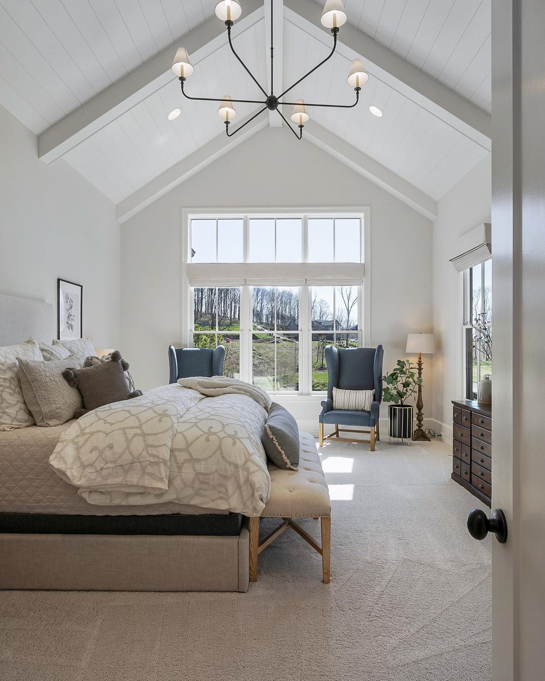 Bright and Airy Bedroom with Cathedral Ceiling