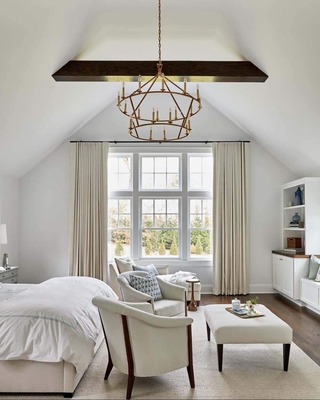 Cozy Bedroom with Contrasting Cathedral Ceiling