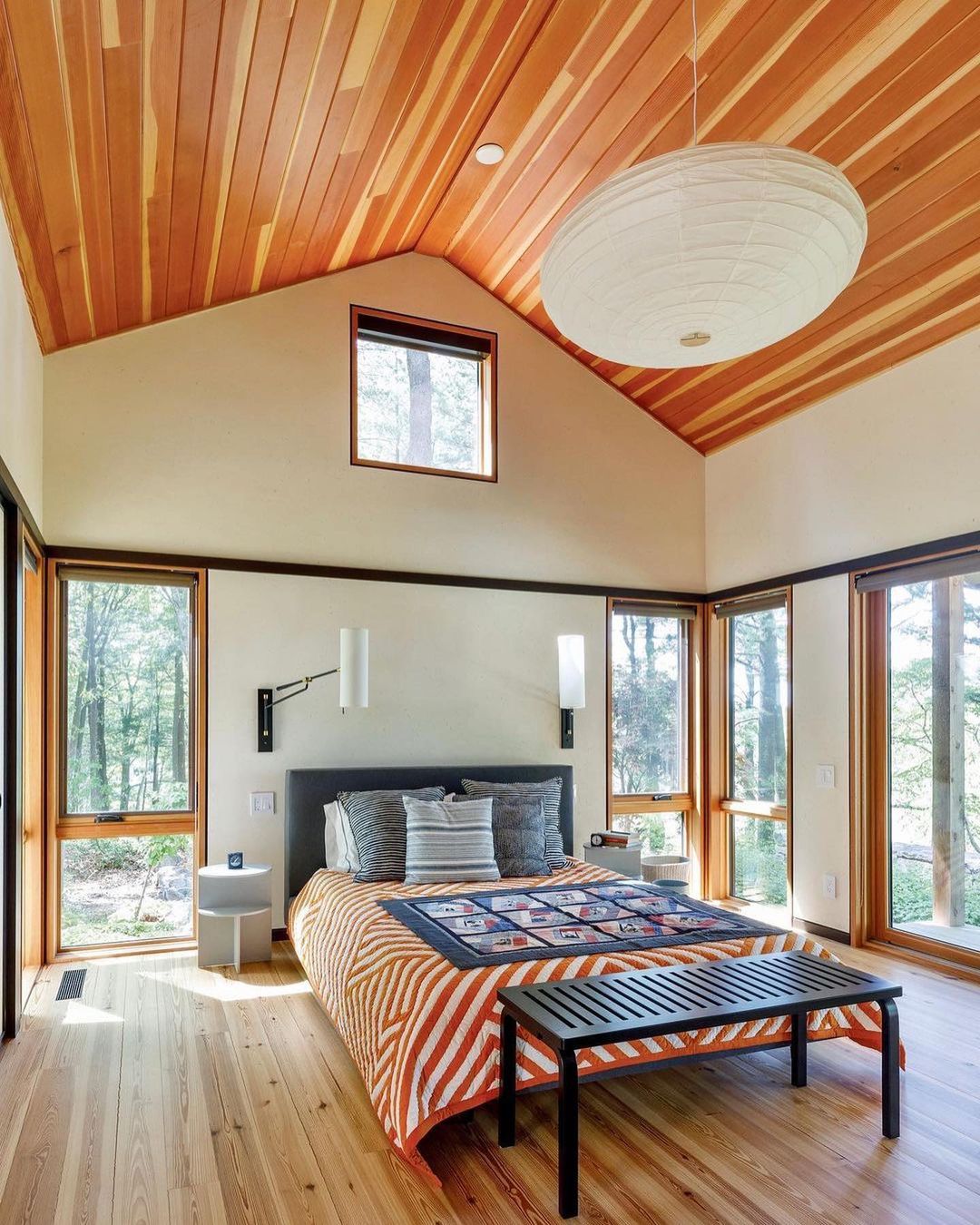 Warm Wooden Cathedral Ceiling in a Modern Bedroom