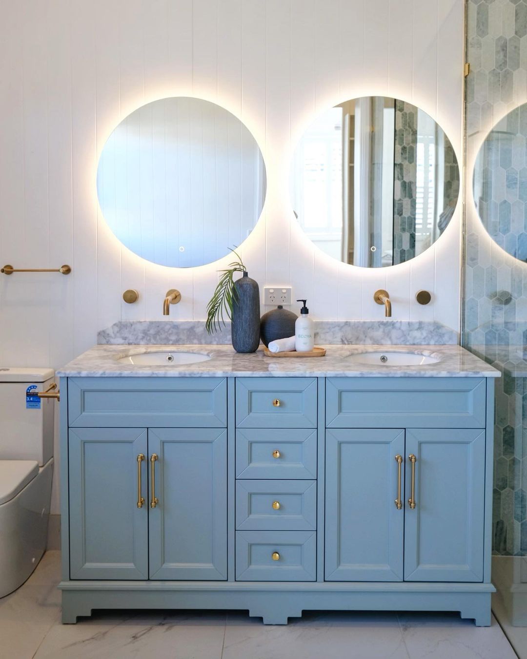 Bold Blue Gray Vanity with Luxurious Details