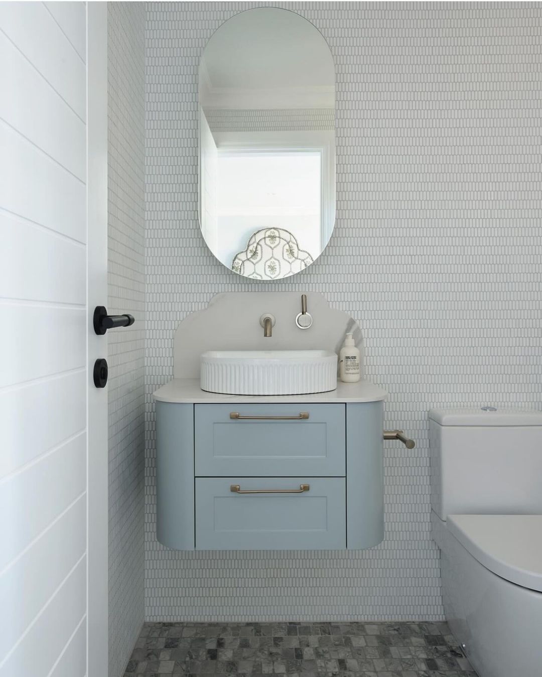 Compact Blue-Gray Vanity in a Stylish Setup