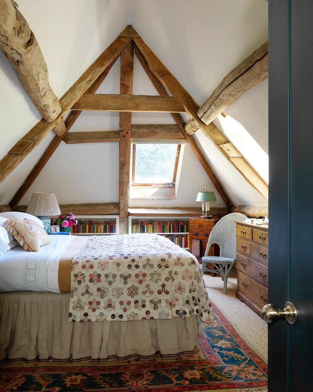 Rustic Retreat: Embracing Attic Character with Timber Beams