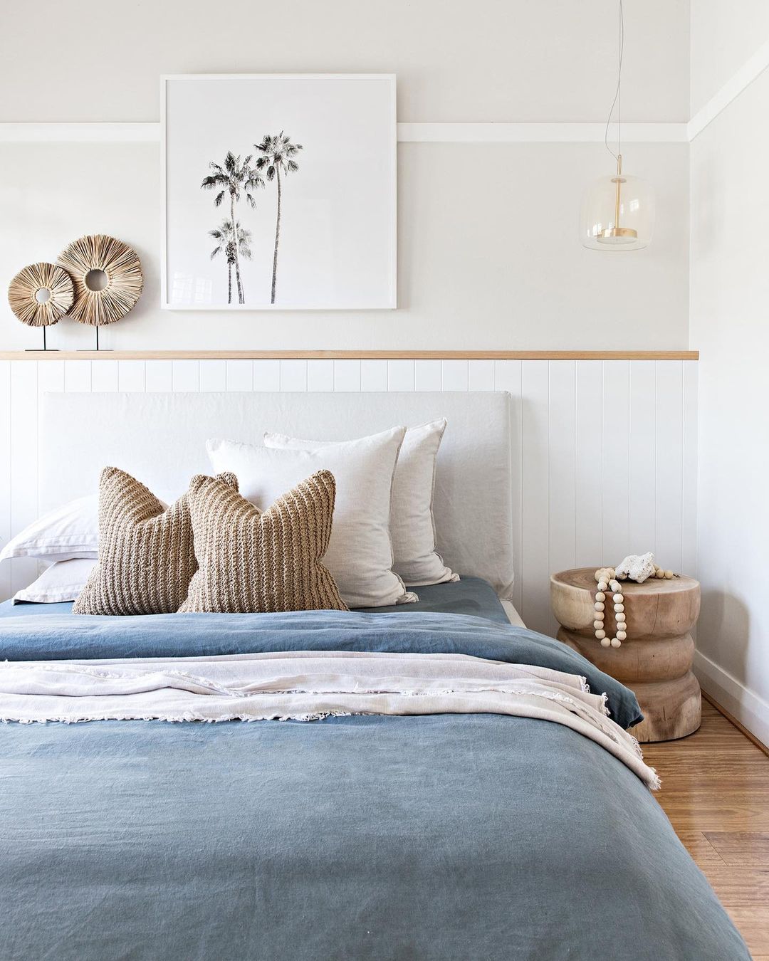 Add Coastal Art and Blue Accents for a Beachy Vibe