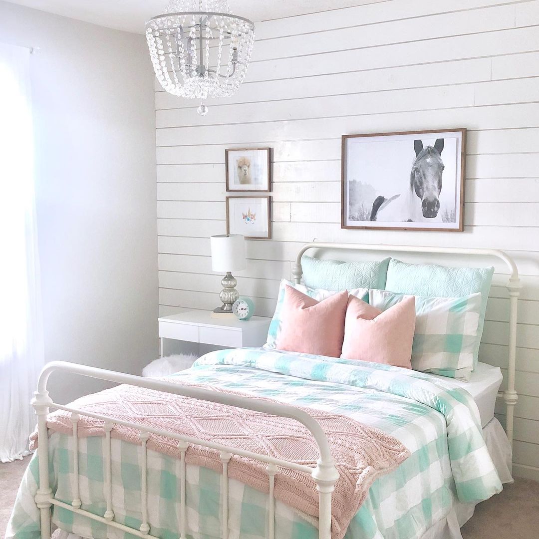 Soft Serenity: White Metal Bed Frame with Pastel Accents