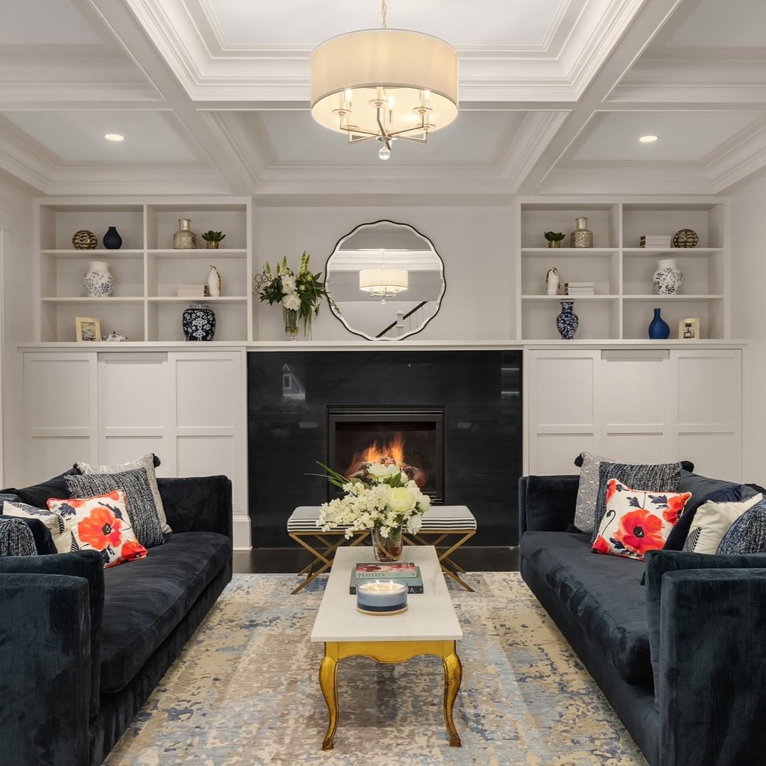 Black Couches in a Luxuriously Detailed Setting