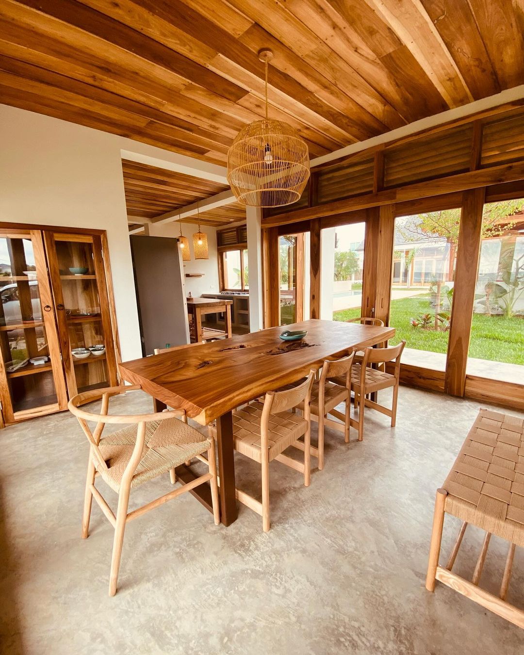 Warm Wood Beams and Open Design for Indoor-Outdoor Living