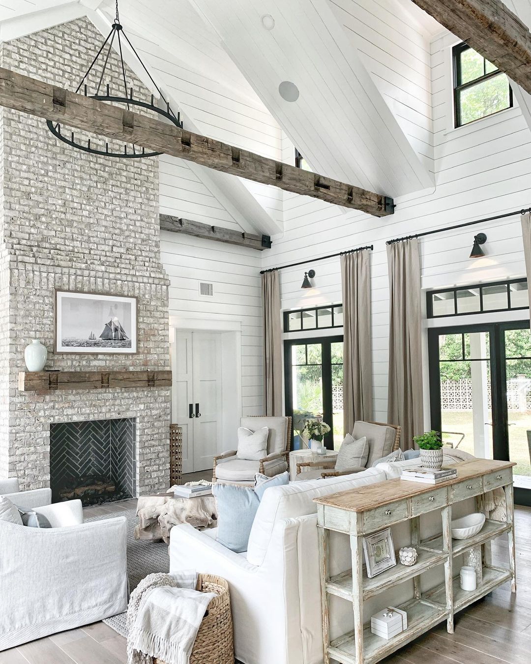 Combining Weathered Beams and Bright Shiplap in a Cosy Living Space