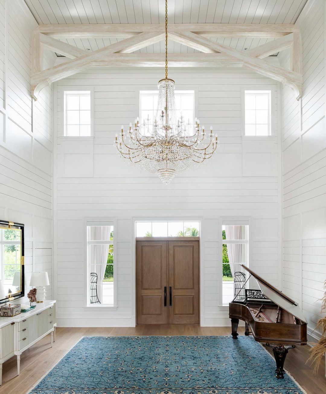 Luxurious Light with Whitewashed Beams and Shiplap for Grand Entrances