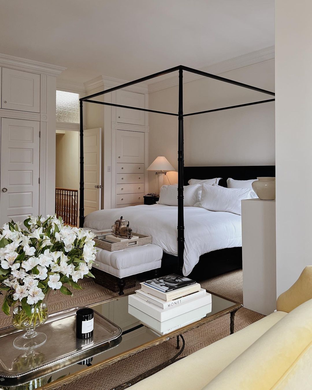 Luxurious Four Poster Bed with Elegant White Bedding