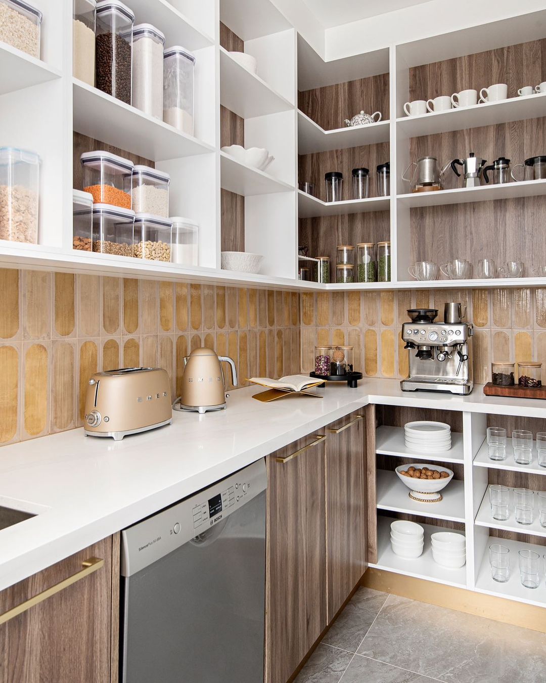 Retro Vibes with Gold-Accented Backsplash in a Modern Pantry