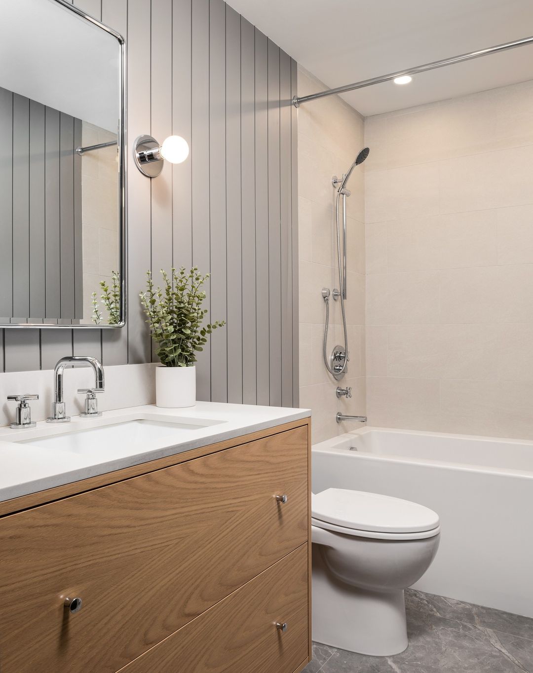 Sleek Bathroom with Vertical Grey Shiplap