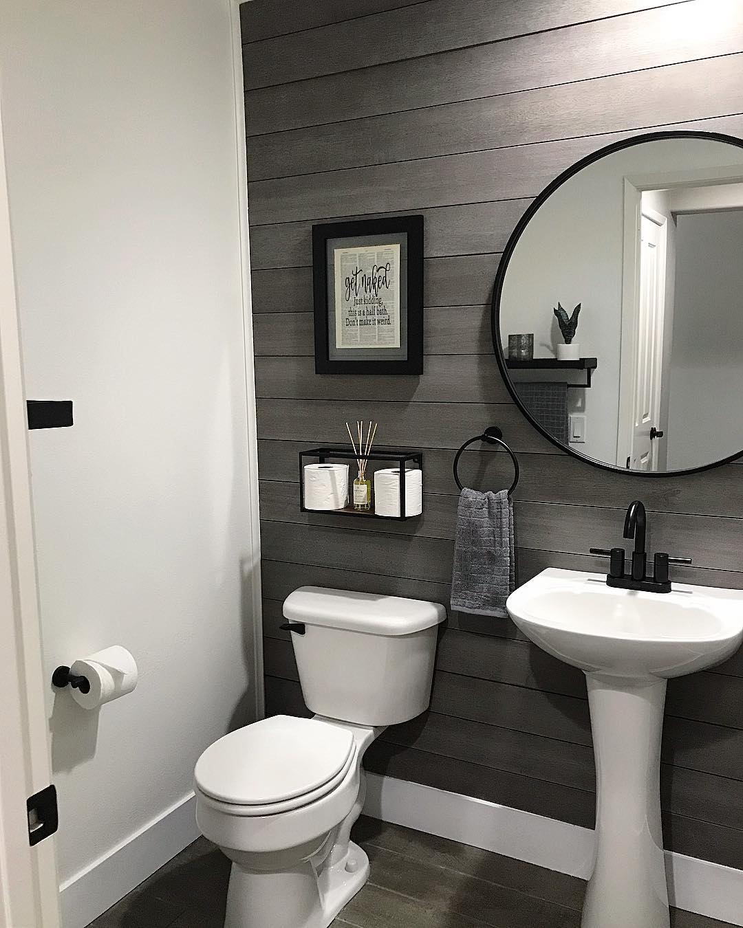 Compact Bathroom with Grey Shiplap and Modern Fixtures