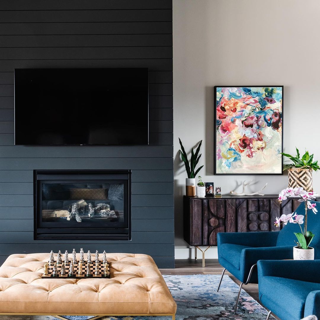 Bold Living Room with Dark Grey Shiplap Fireplace