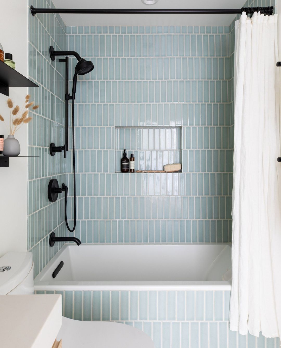 Bright and Refreshing Small Bathroom with Blue Tiles