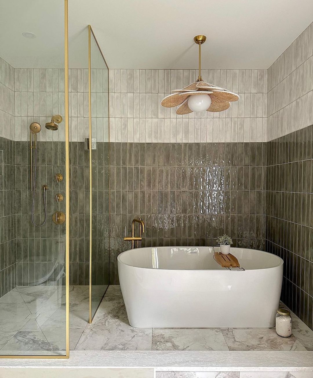 Elegant Contrast with Dark Tiles and Gold Fixtures