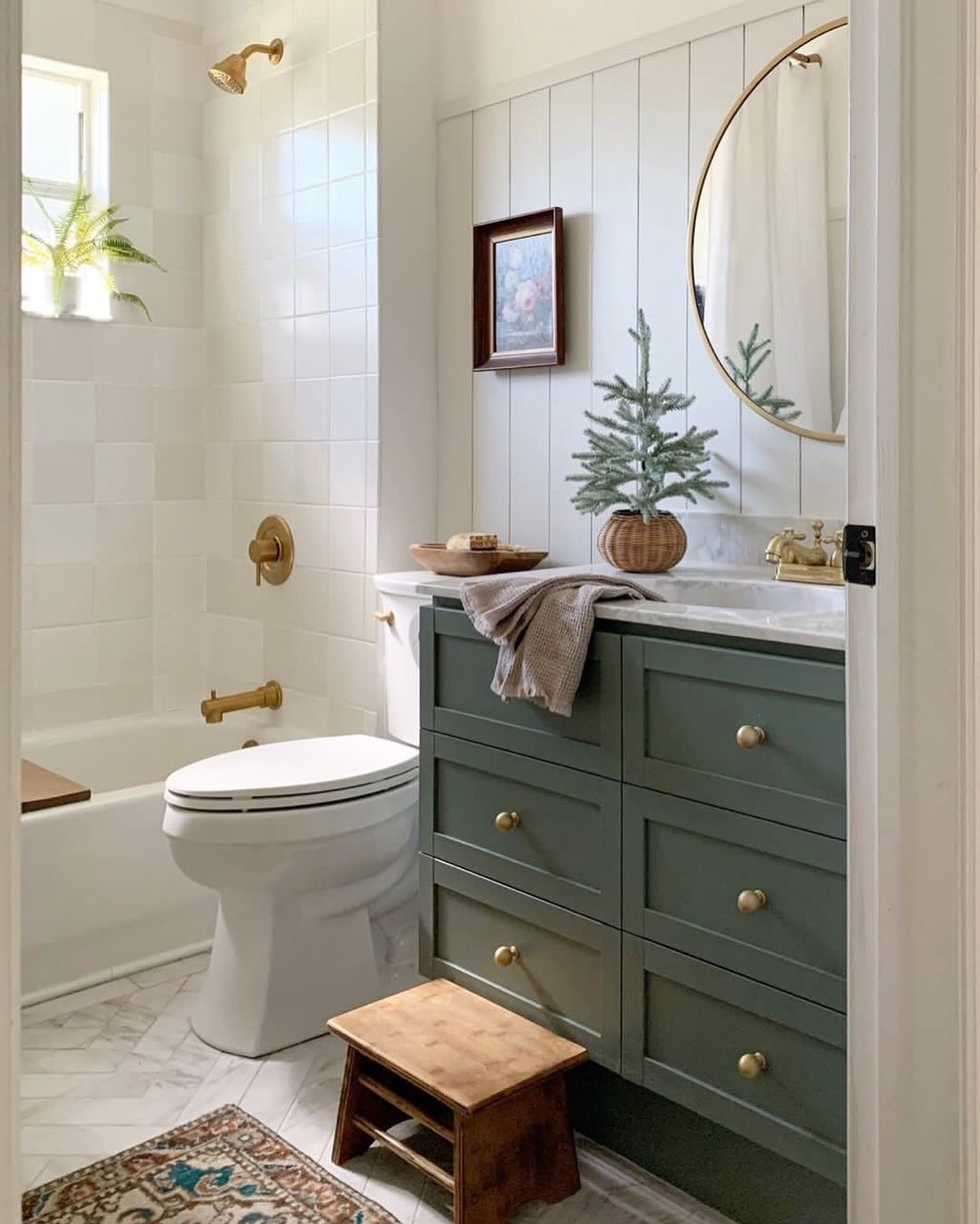 Charming Small Bathroom with Bold Cabinetry