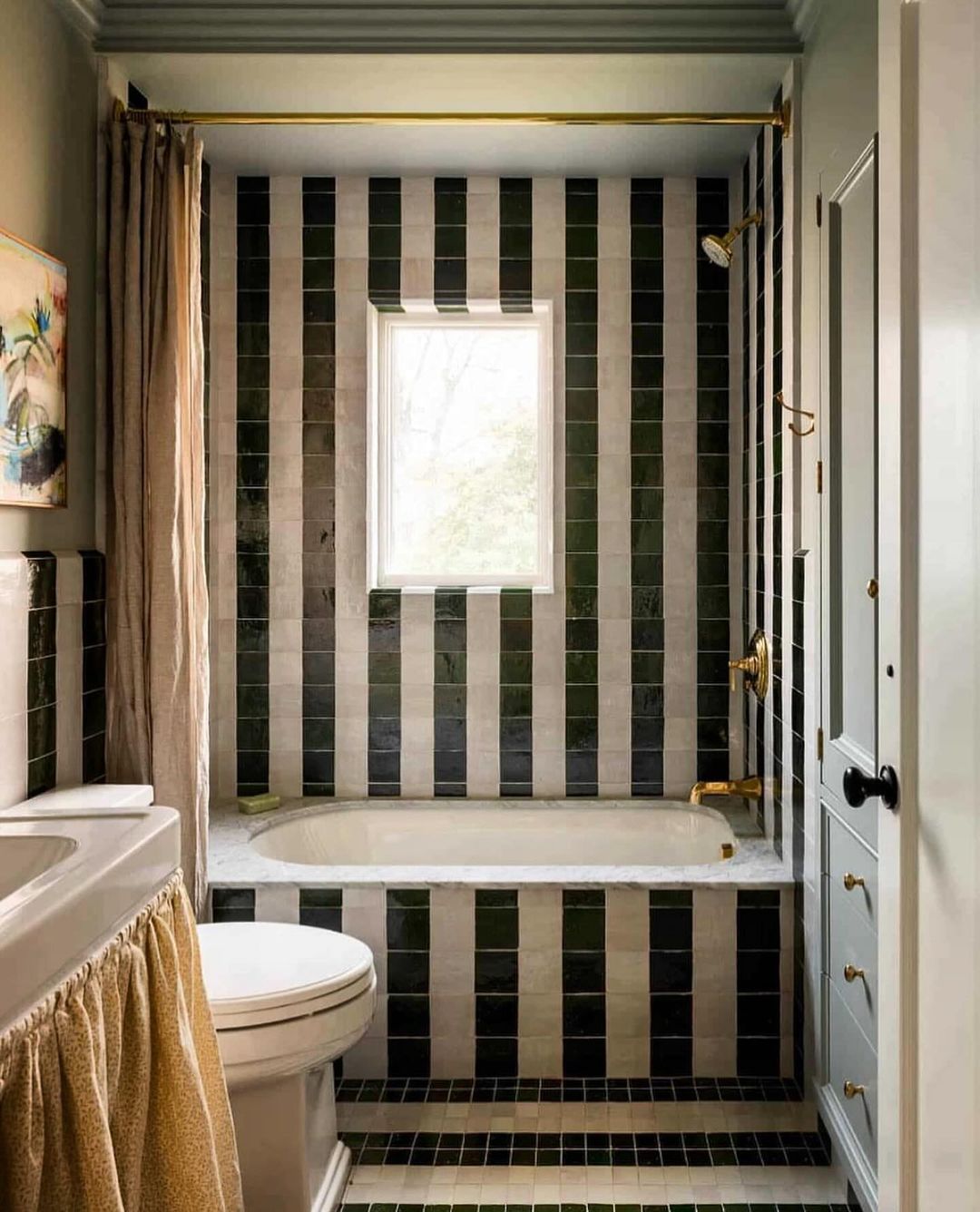 Bold Stripes and Classic Elegance in a Small Bathroom