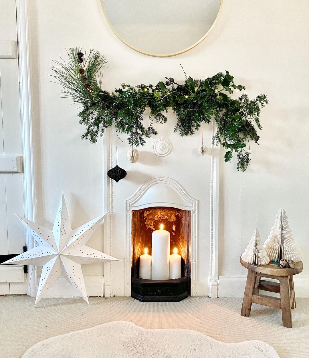 Scandinavian Fireplace with Simple Flameless Candles inside Arrangement