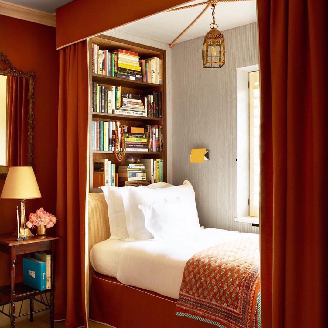 Cozy Reading Nook in Red Bedroom