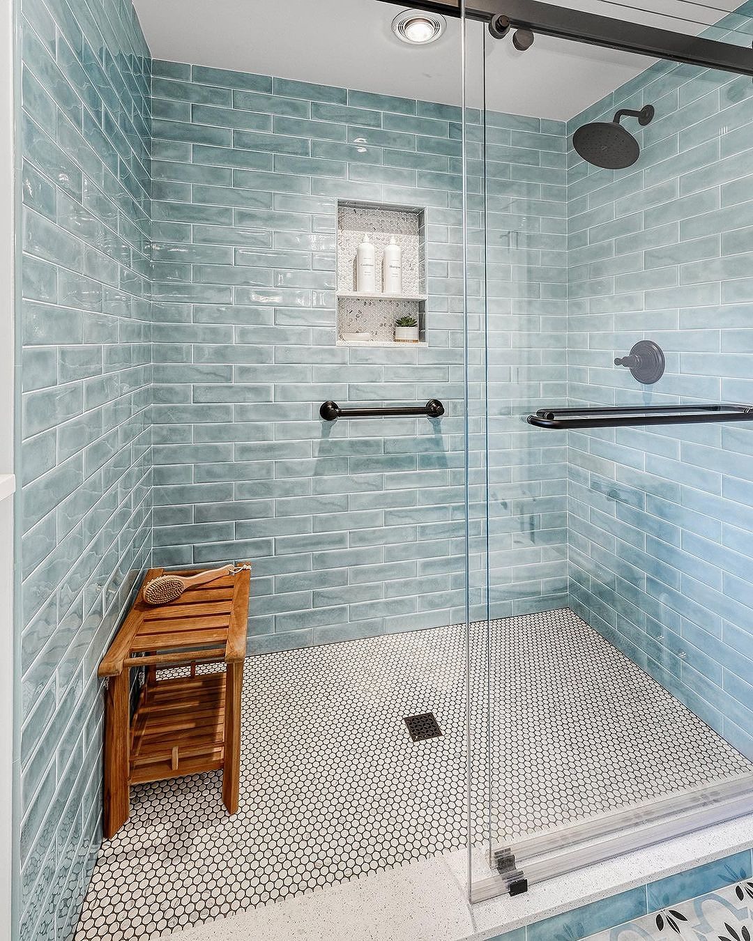 Vibrant Aqua Tile Shower with Penny Tile Pan and Niche