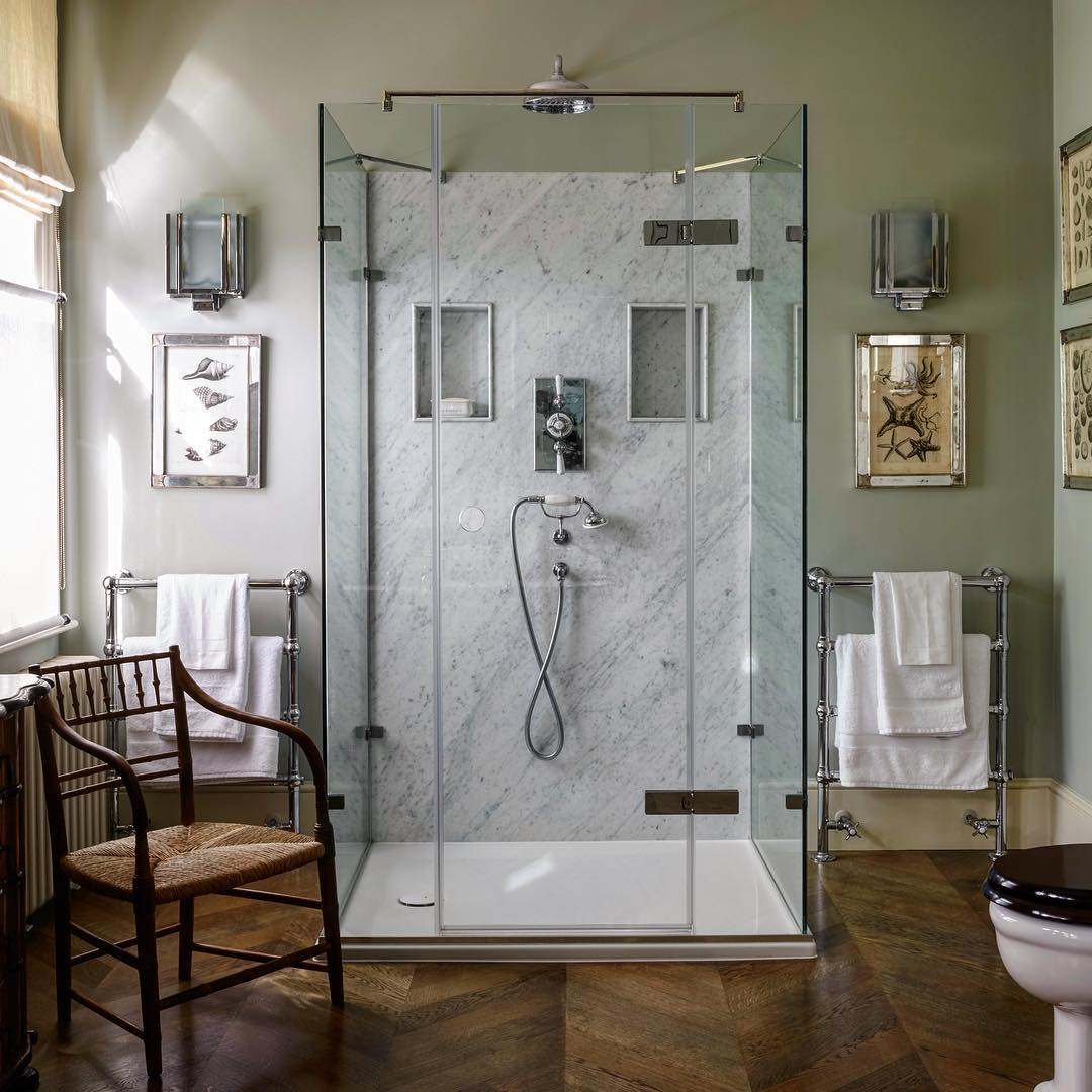 Classic Marble Shower with Dual Niches and Chrome Fixtures