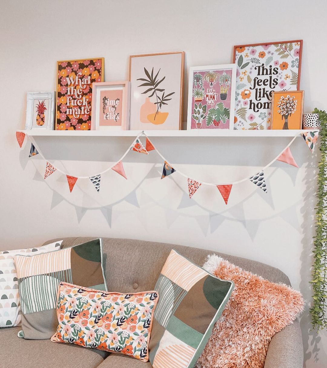 Colorful Living Room with Playful Picture Ledge and Bunting