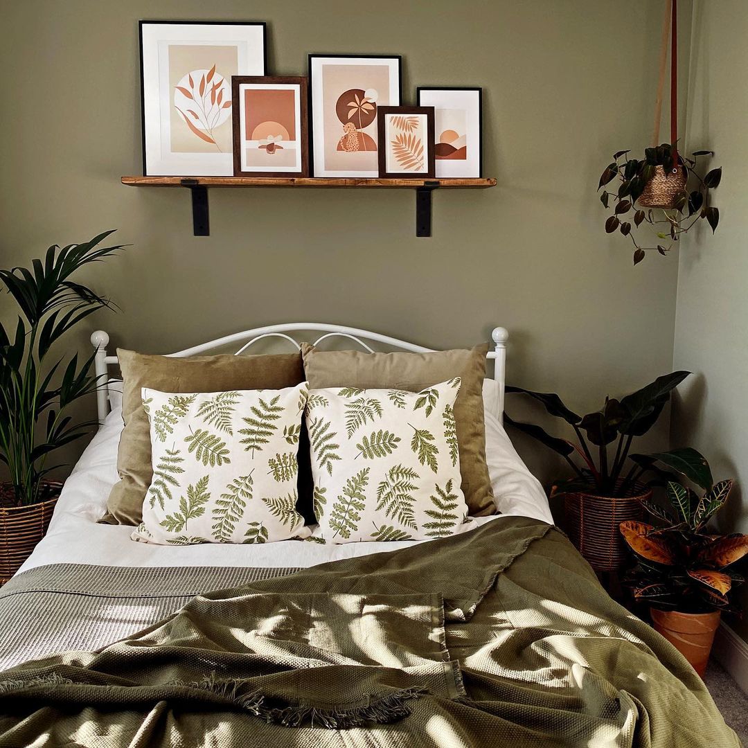 Cozy Bedroom with Botanical Picture Ledge Display