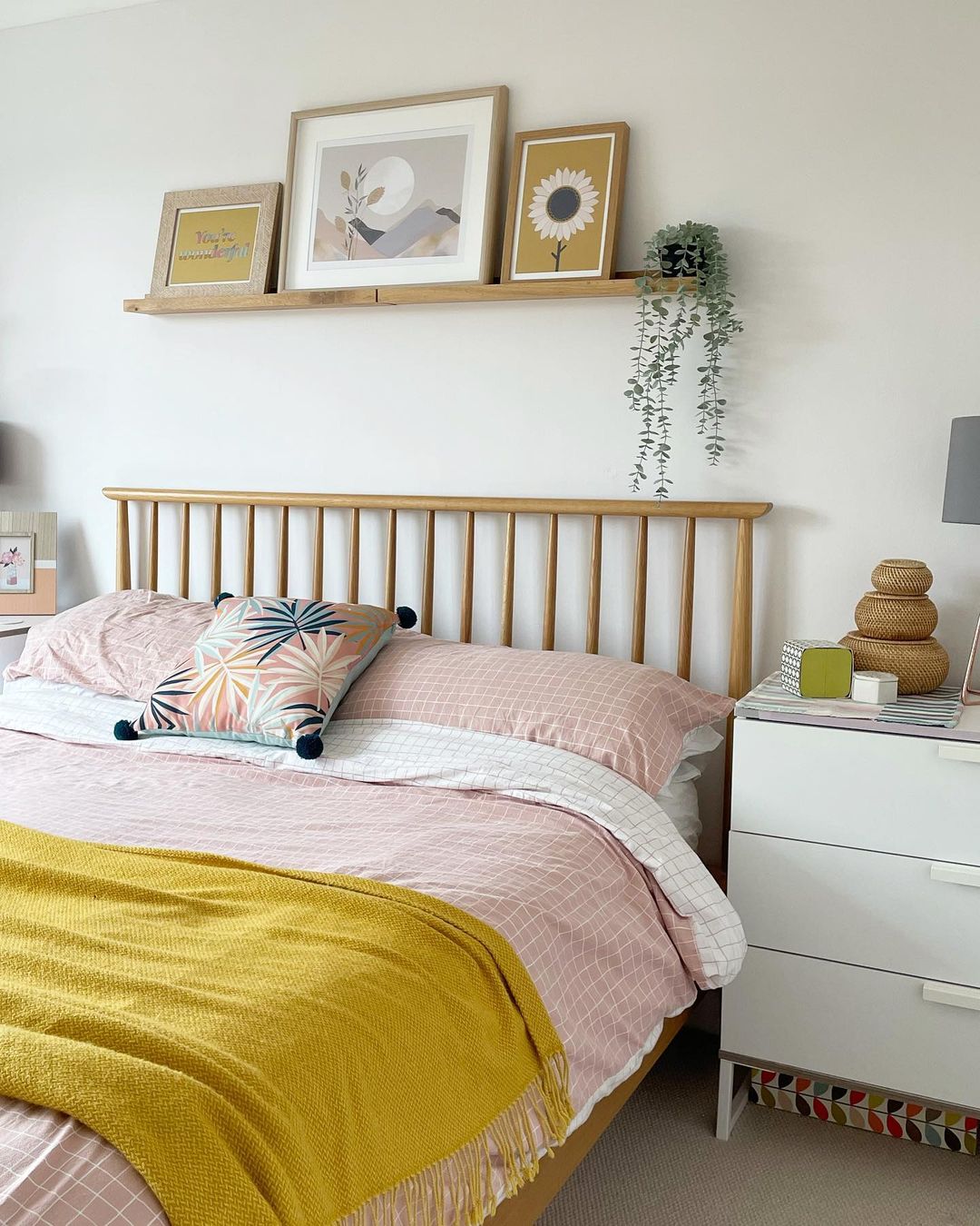 Vibrant Bedroom with Uplifting Picture Ledge Display