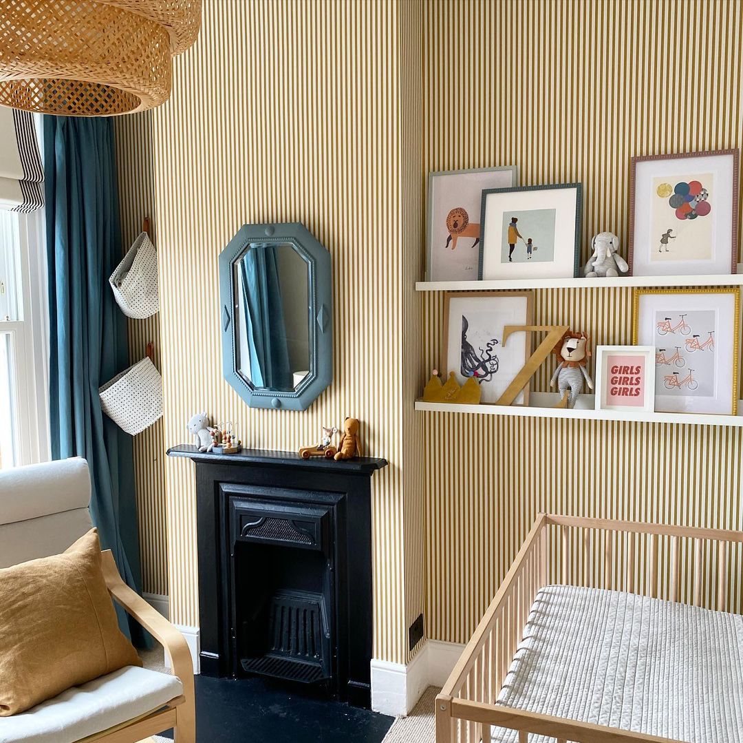 Charming Nursery with Playful Picture Ledge Display